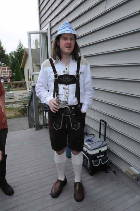 Tom Stratton enjoying Oktoberfest with beer that he brewed